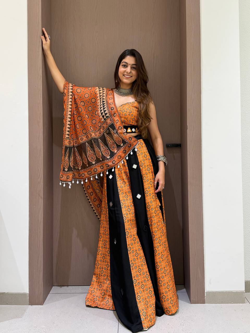 Orange & Black Printed Rayon Mirror Work Navratri Lehenga Choli with Dupatta