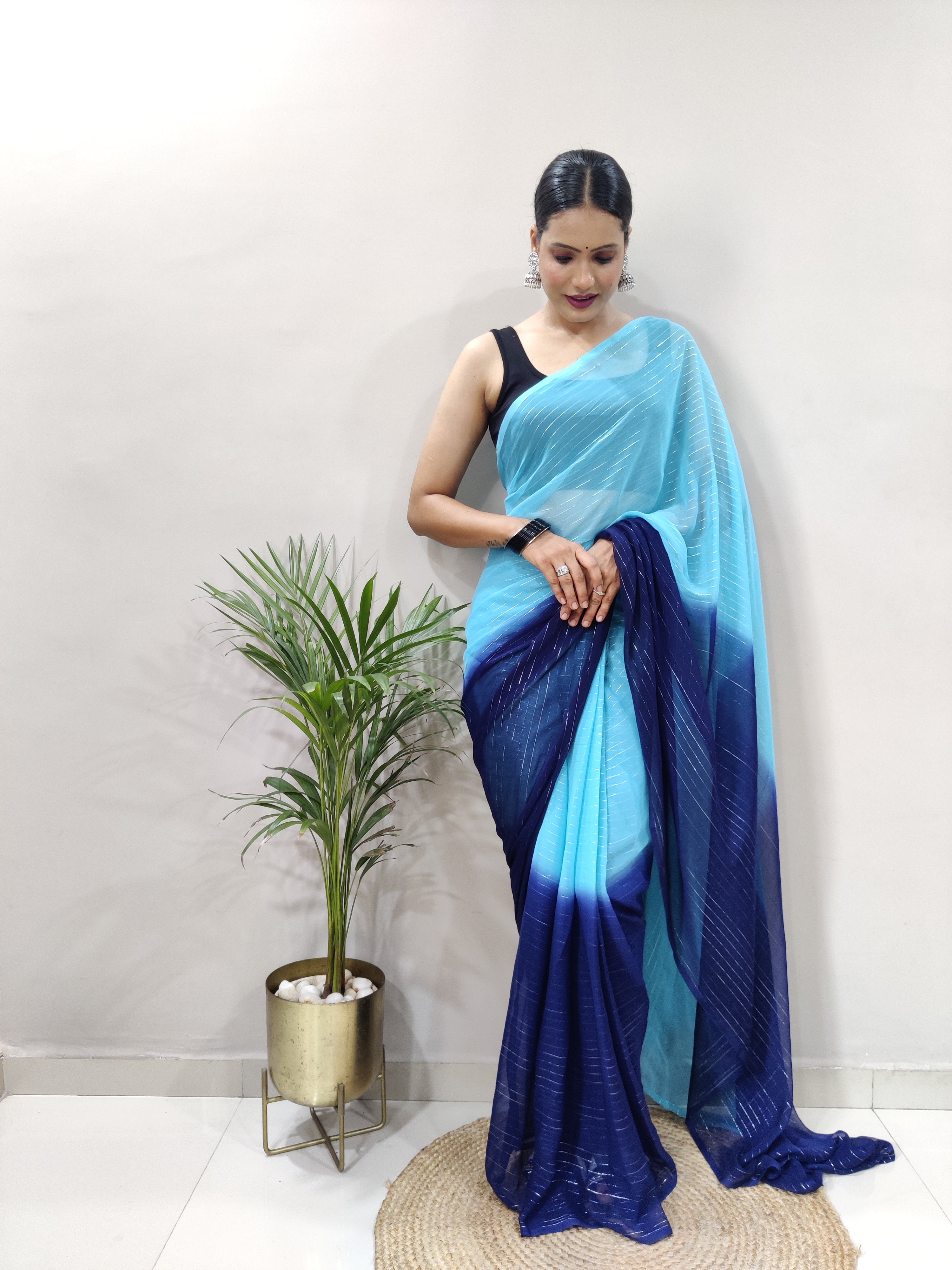 Fancy Pure Bloomy Blue Viscose Fabric with zari lining and fancy lace border Neeva Fashion