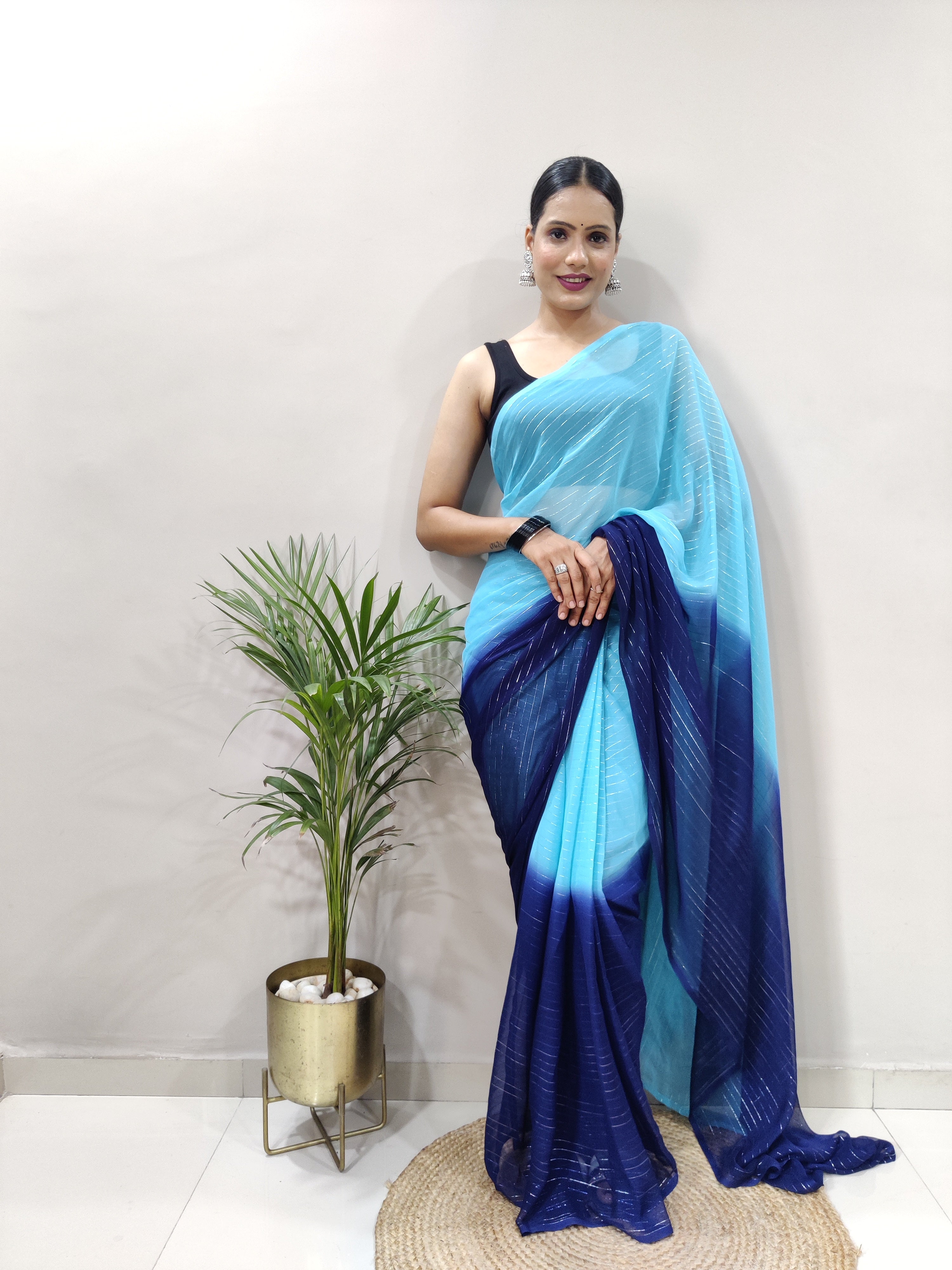 Fancy Pure Bloomy Blue Viscose Fabric with zari lining and fancy lace border Neeva Fashion