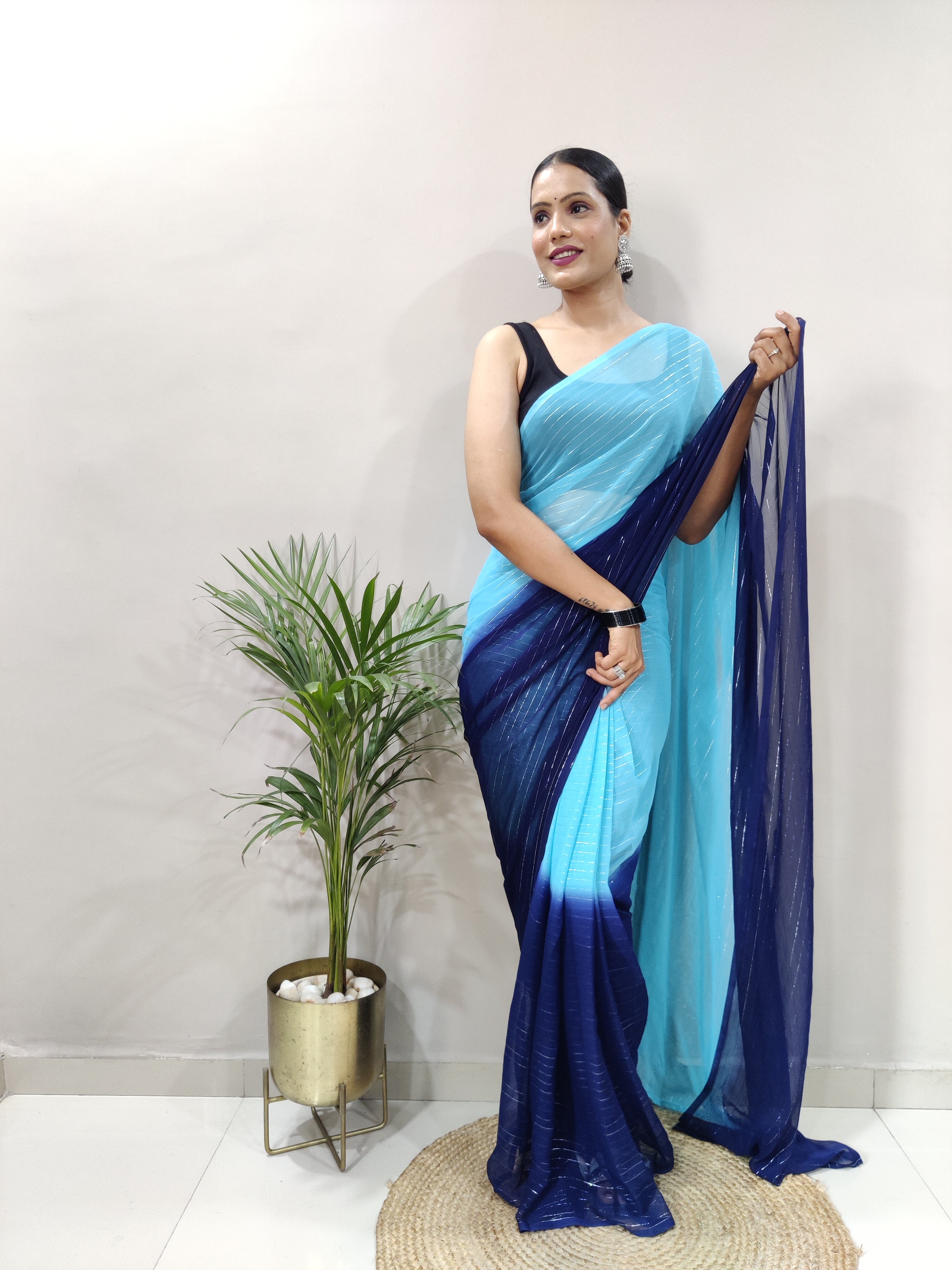 Fancy Pure Bloomy Blue Viscose Fabric with zari lining and fancy lace border Neeva Fashion