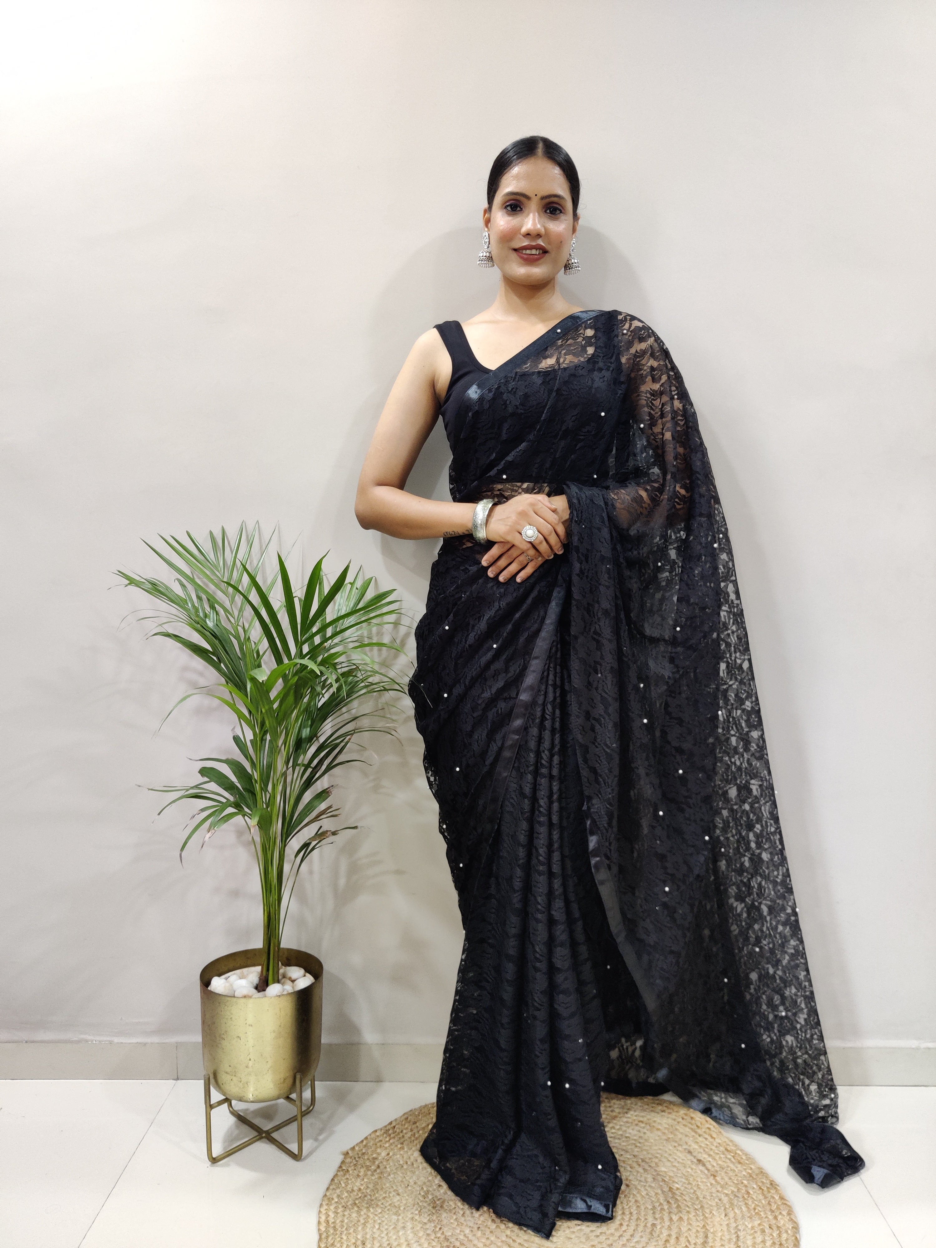 Fancy Brasso Black Saree Divashree