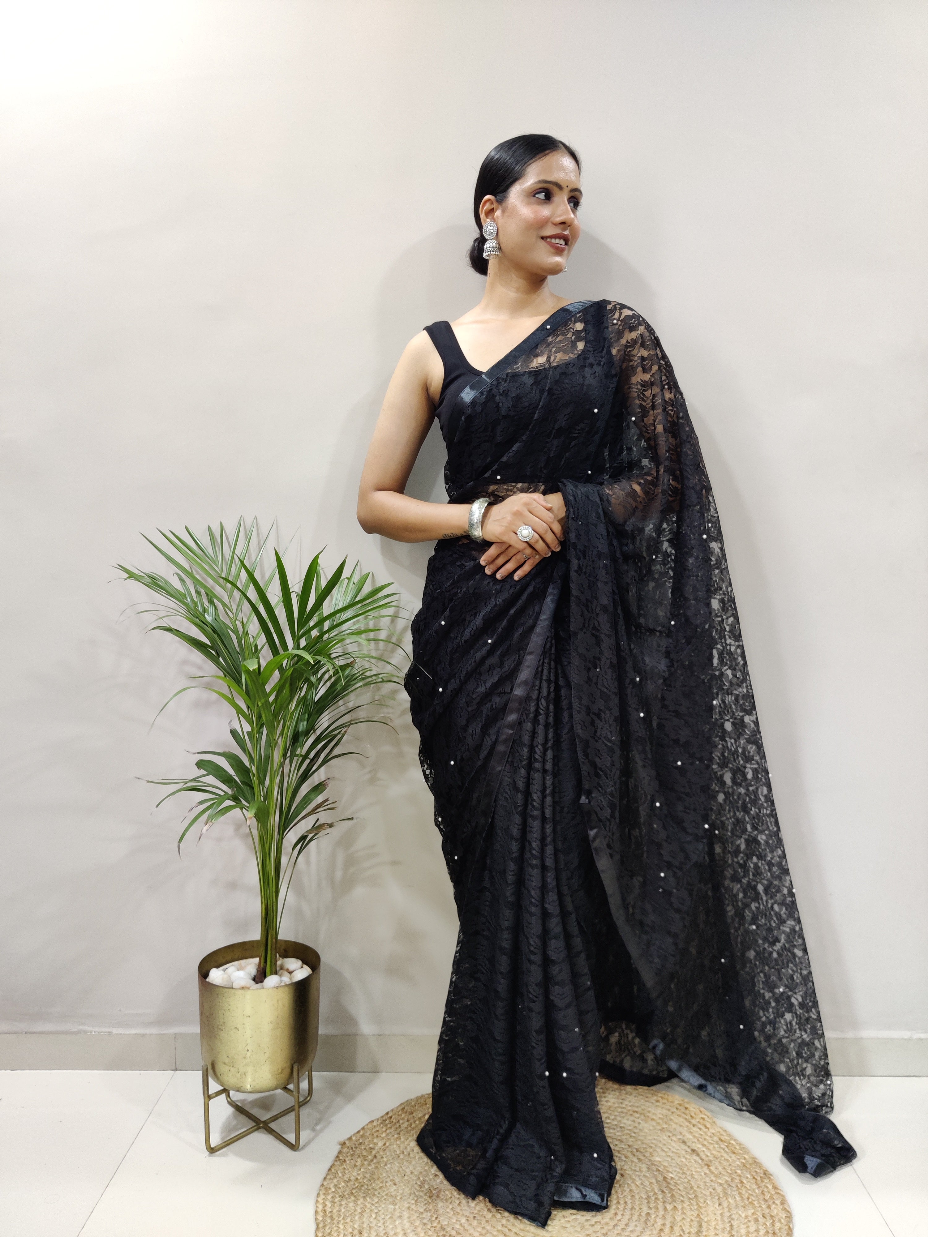 Fancy Brasso Black Saree Divashree