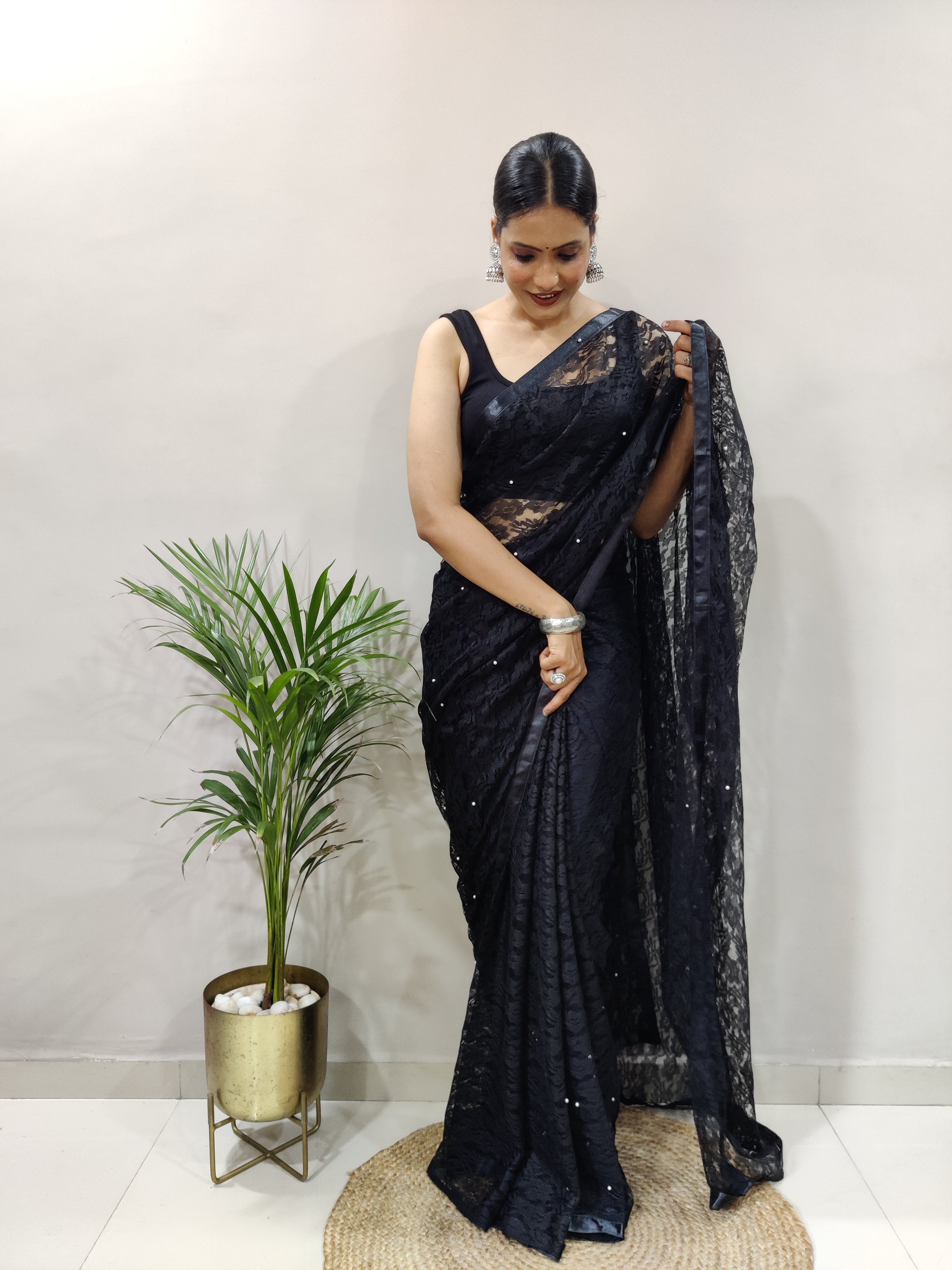 Fancy Brasso Black Saree Divashree