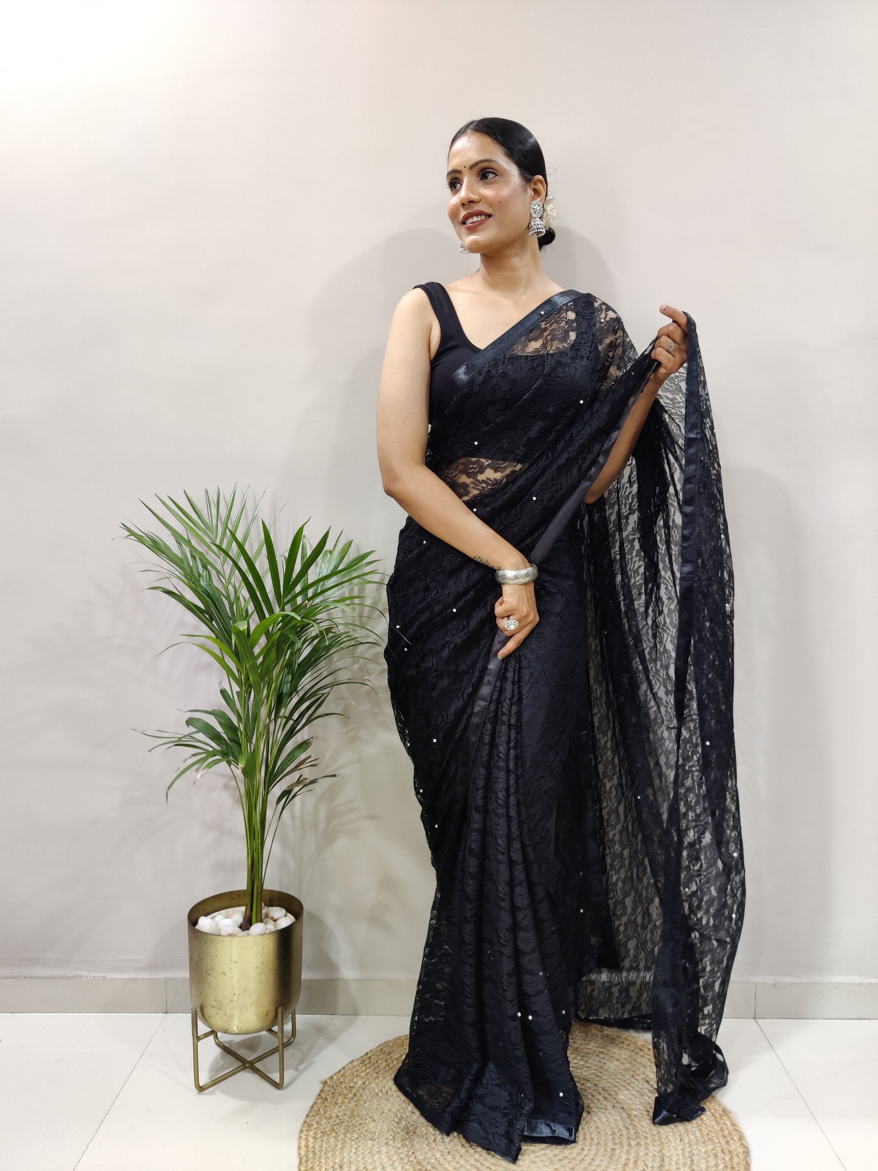 Fancy Brasso Black Saree Divashree