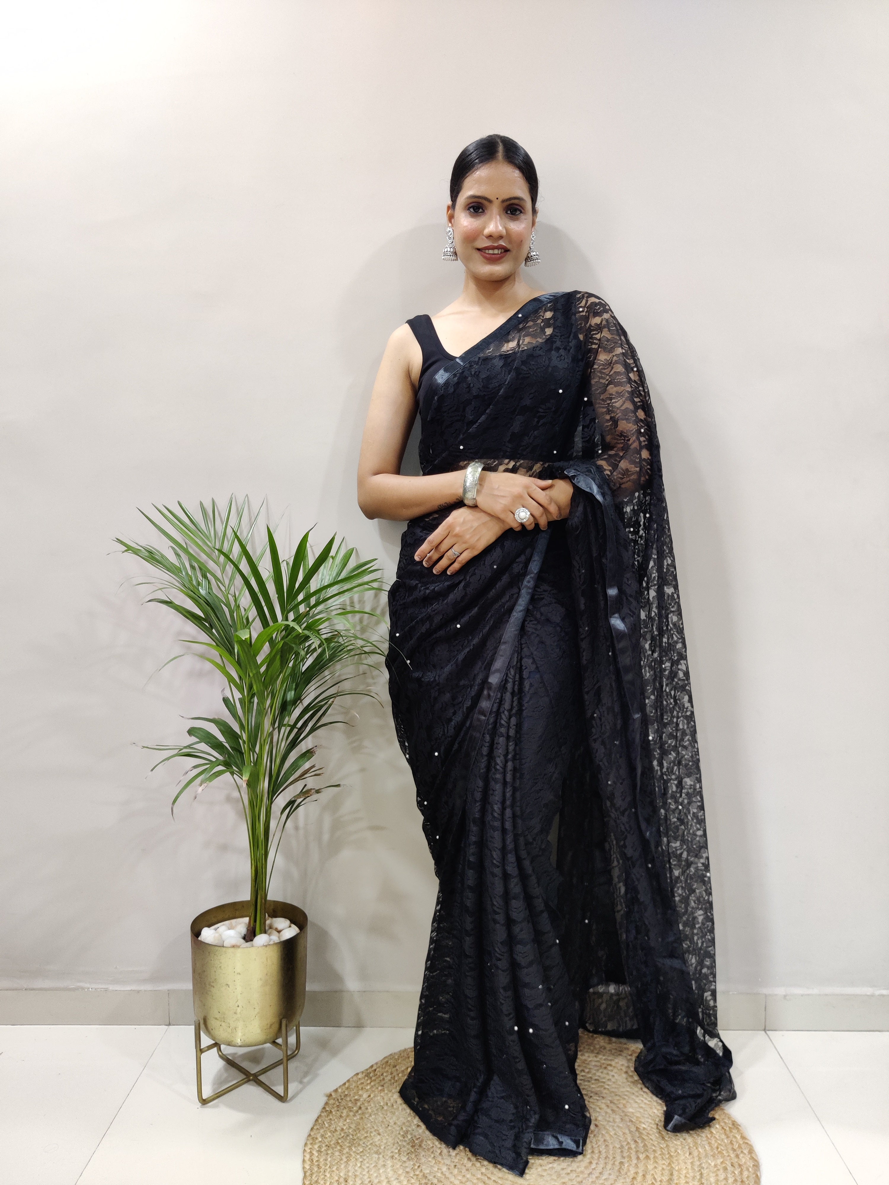 Fancy Brasso Black Saree Divashree